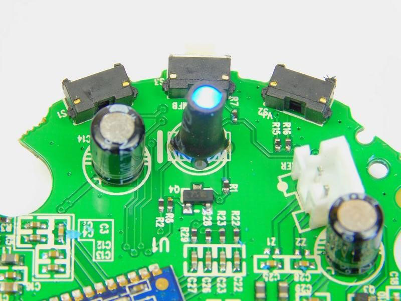 The glowing LED indicator and the switches